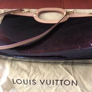 Brand new Louis patent evening bag